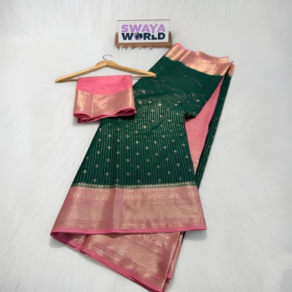 Green and pink saree with a hanger on a white background, branded 'Swaya World'.