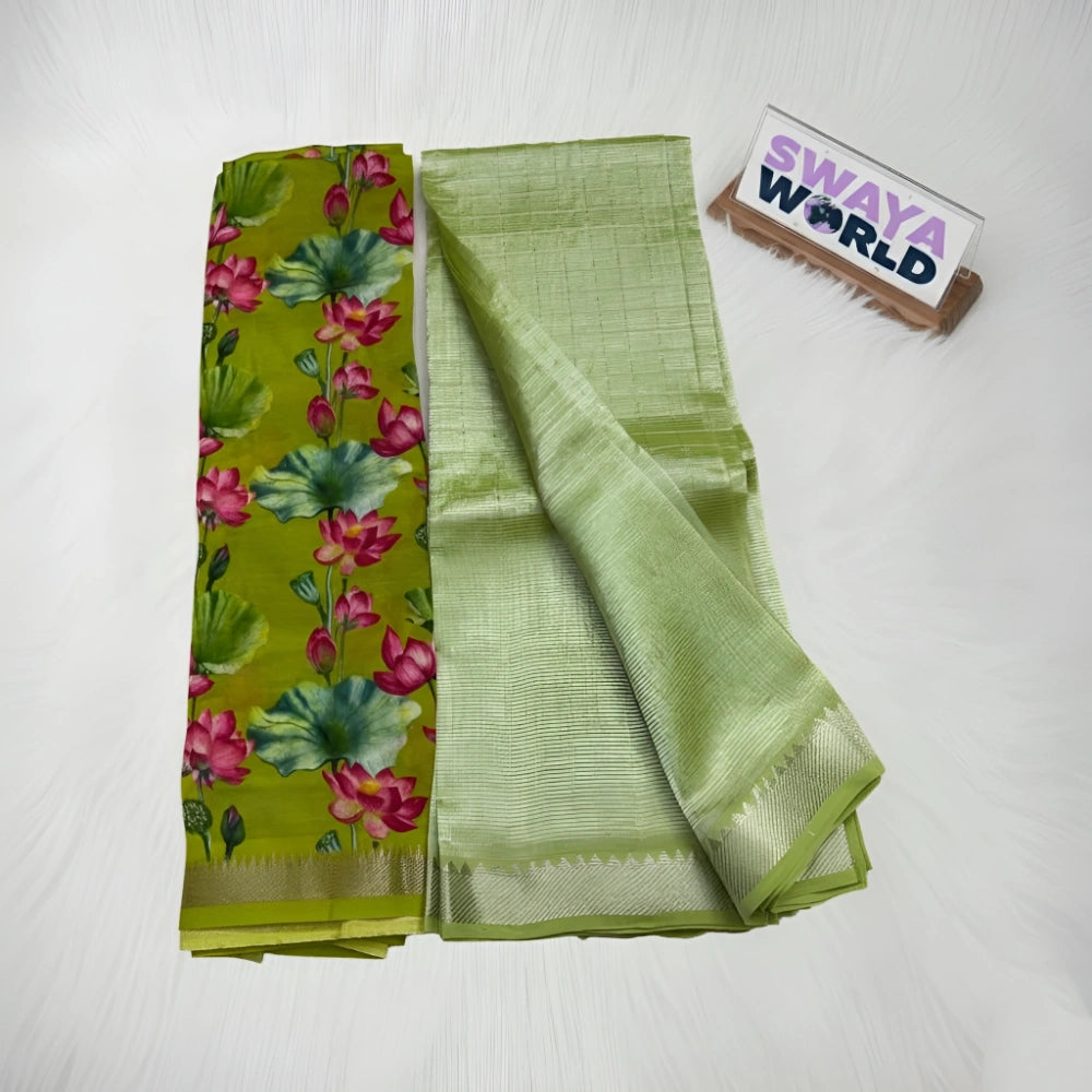 Two green sarees, one with floral pattern, on a white surface with 'Swaya World' branding.
