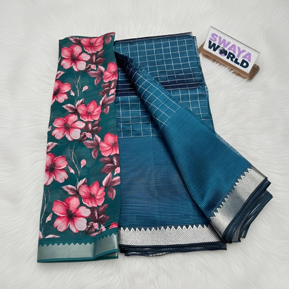 Two sarees, one with floral pattern and the other blue with silver border, on a white surface with 'Swaya World' branding.