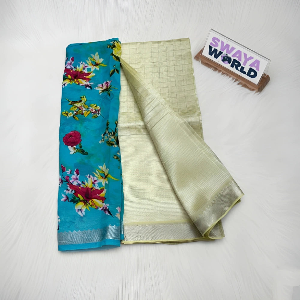 Two sarees, one floral blue and one beige with a pattern, on a white surface with 'Swaya World' branding.