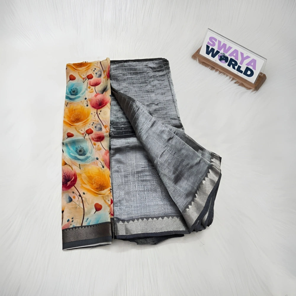 Two folded sarees, one with floral pattern and the other gray, next to a box labeled 'Swaya World' on a light background.