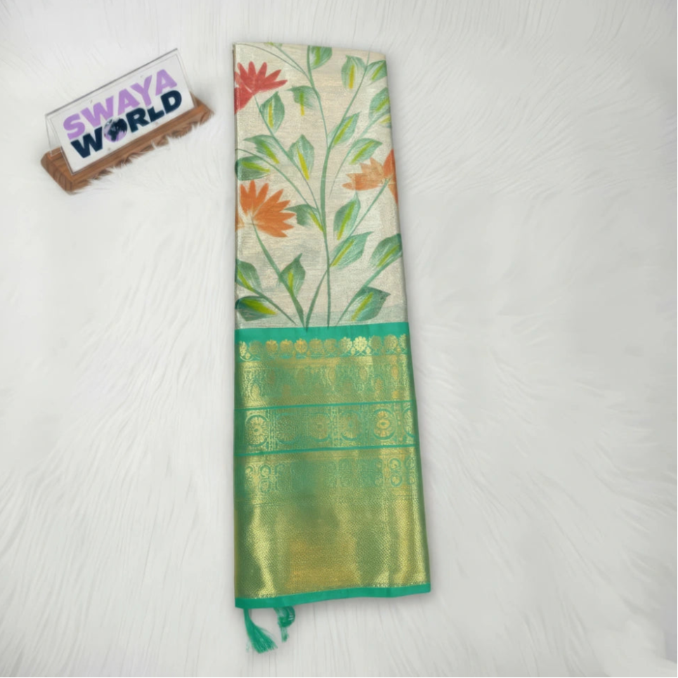 Green colour Soft Banarasi tissue silk saree with hand‑painted jaal and contrast Kanchi border,  featuring the brand 'Swaya World'.