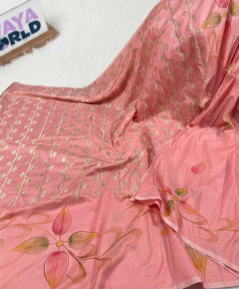 Pink saree with leaf patterns on a white background