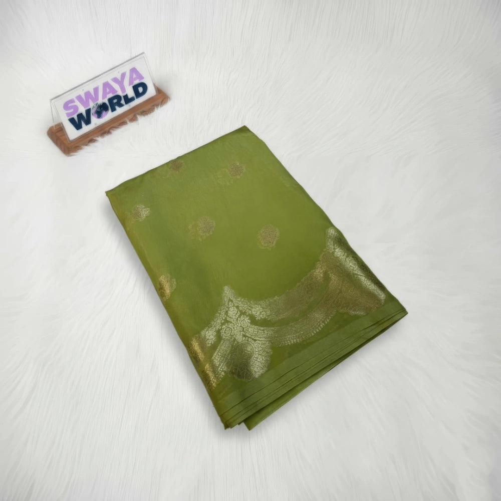 Green fabric with gold patterns on a white background, featuring 'Swaya World' branding.