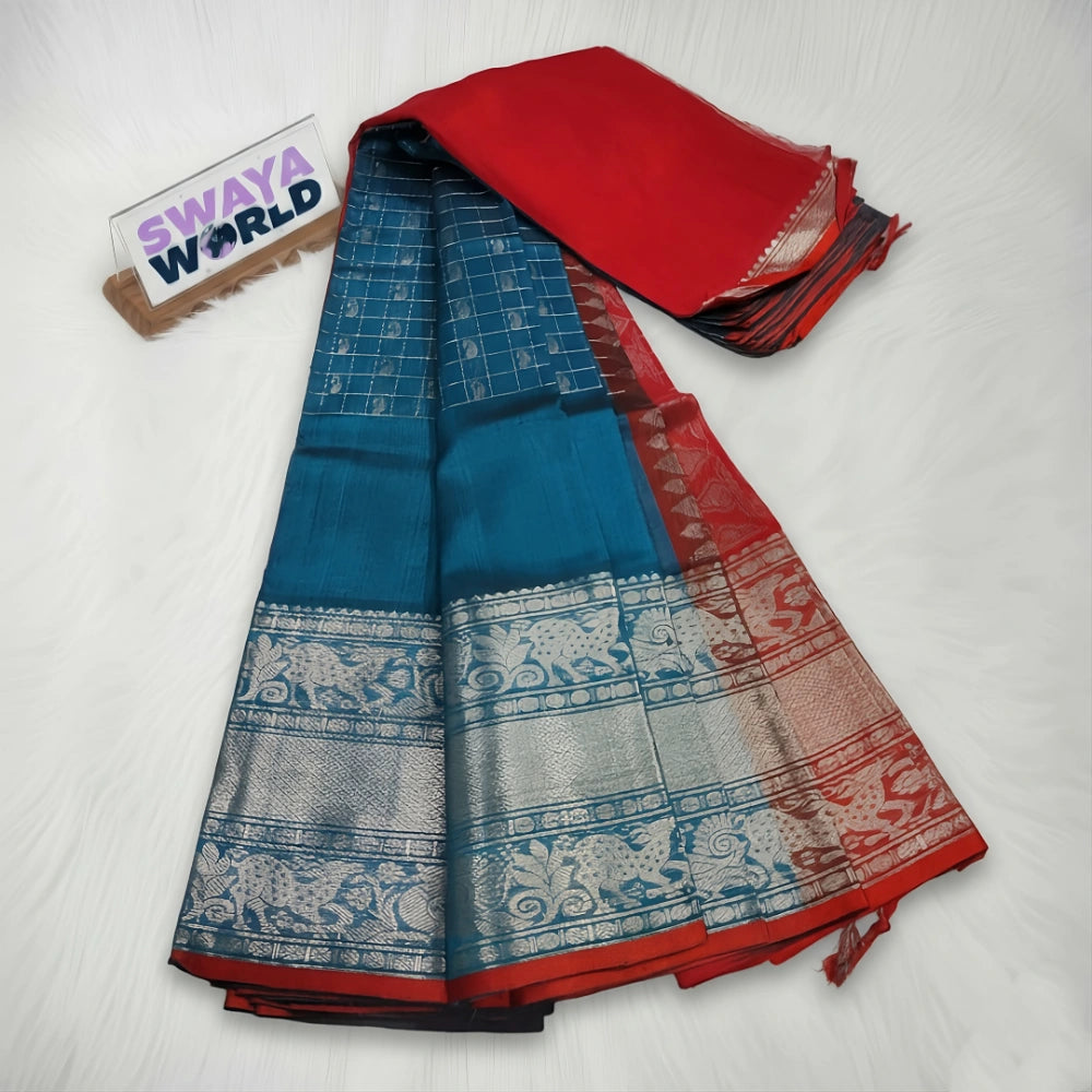 Blue and red saree with a visible brand logo on a white background