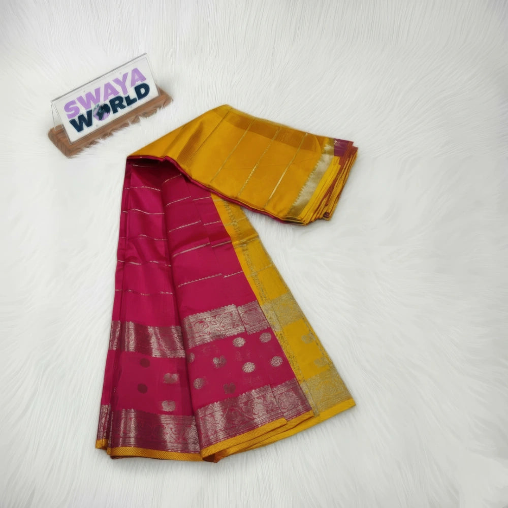 Yellow and pink saree with a visible brand label on a white background