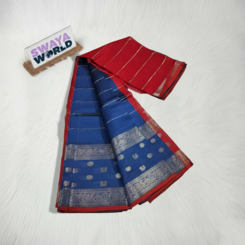 Red and blue saree with silver patterns on a white background, branded 'Swaya World'.