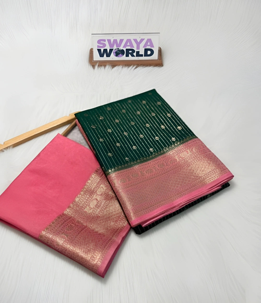 Pink and green saree with a visible brand name on a white background