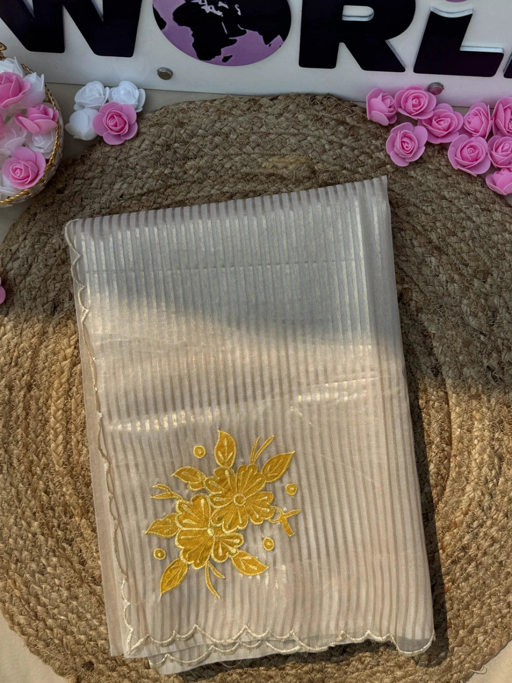 Premium Organza Saree with Zari Stripes & All-Over Appliqué Floral Work – Jacquard Brocade Blouse with Appliqué Butta Sleeves