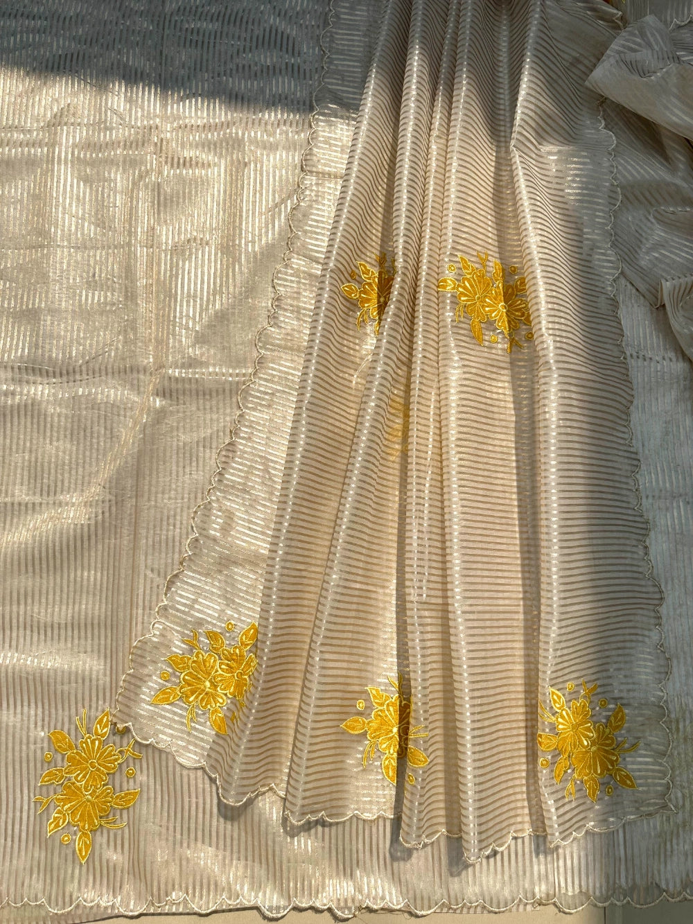 Premium Organza Saree with Zari Stripes & All-Over Appliqué Floral Work – Jacquard Brocade Blouse with Appliqué Butta Sleeves