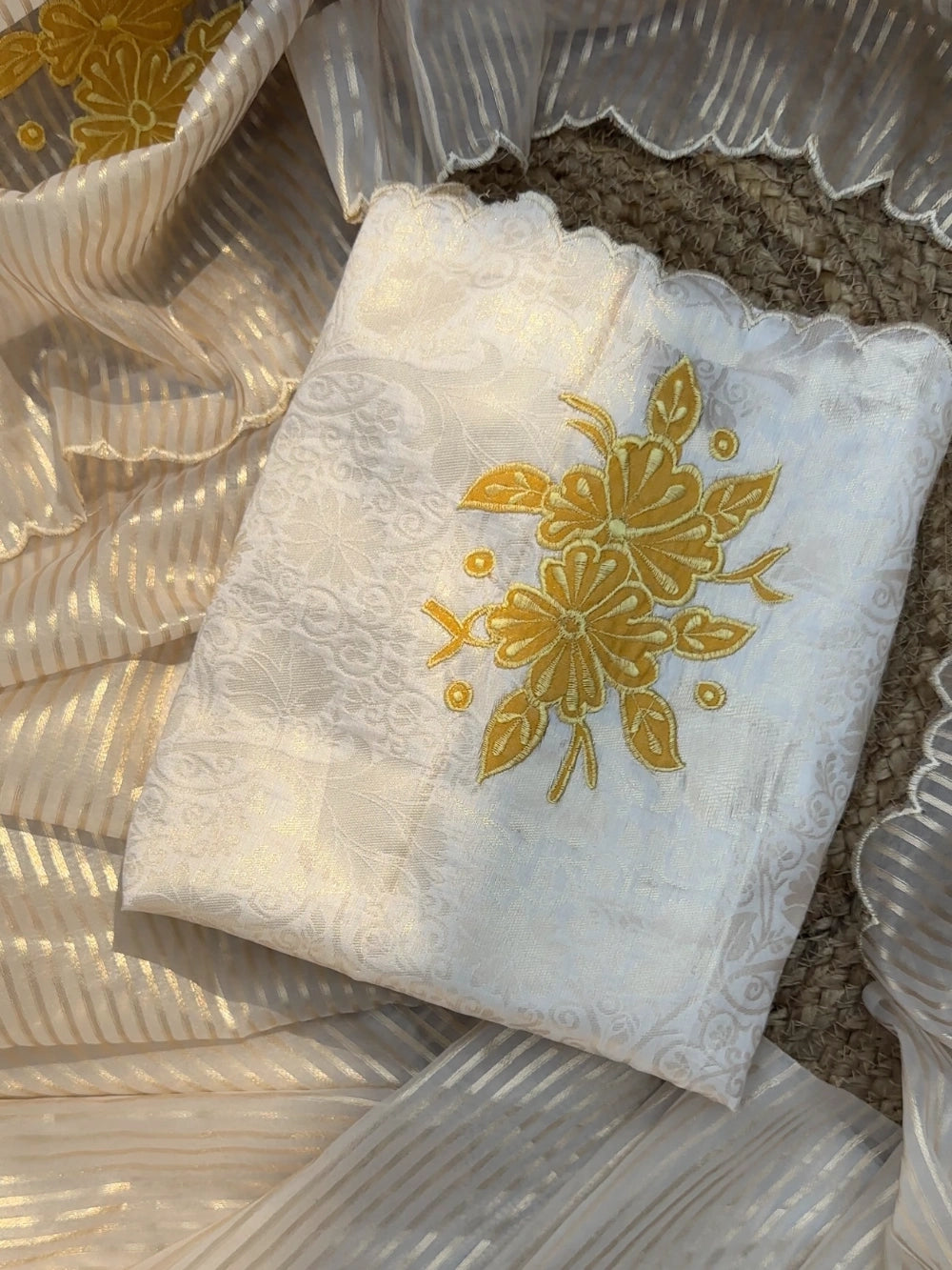 Premium Organza Saree with Zari Stripes & All-Over Appliqué Floral Work – Jacquard Brocade Blouse with Appliqué Butta Sleeves