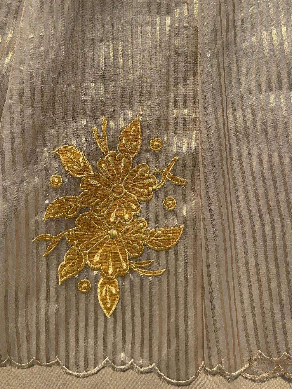 Premium Organza Saree with Zari Stripes & All-Over Appliqué Floral Work – Jacquard Brocade Blouse with Appliqué Butta Sleeves