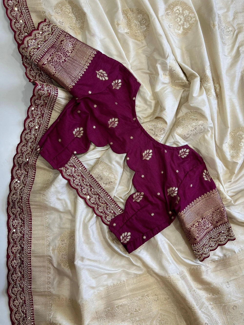 Pure Banarasi Pattu Saree with All-Over Floral Weaving, Double Scalloped Embroidery Border & Contrast Designer Stitched Blouse