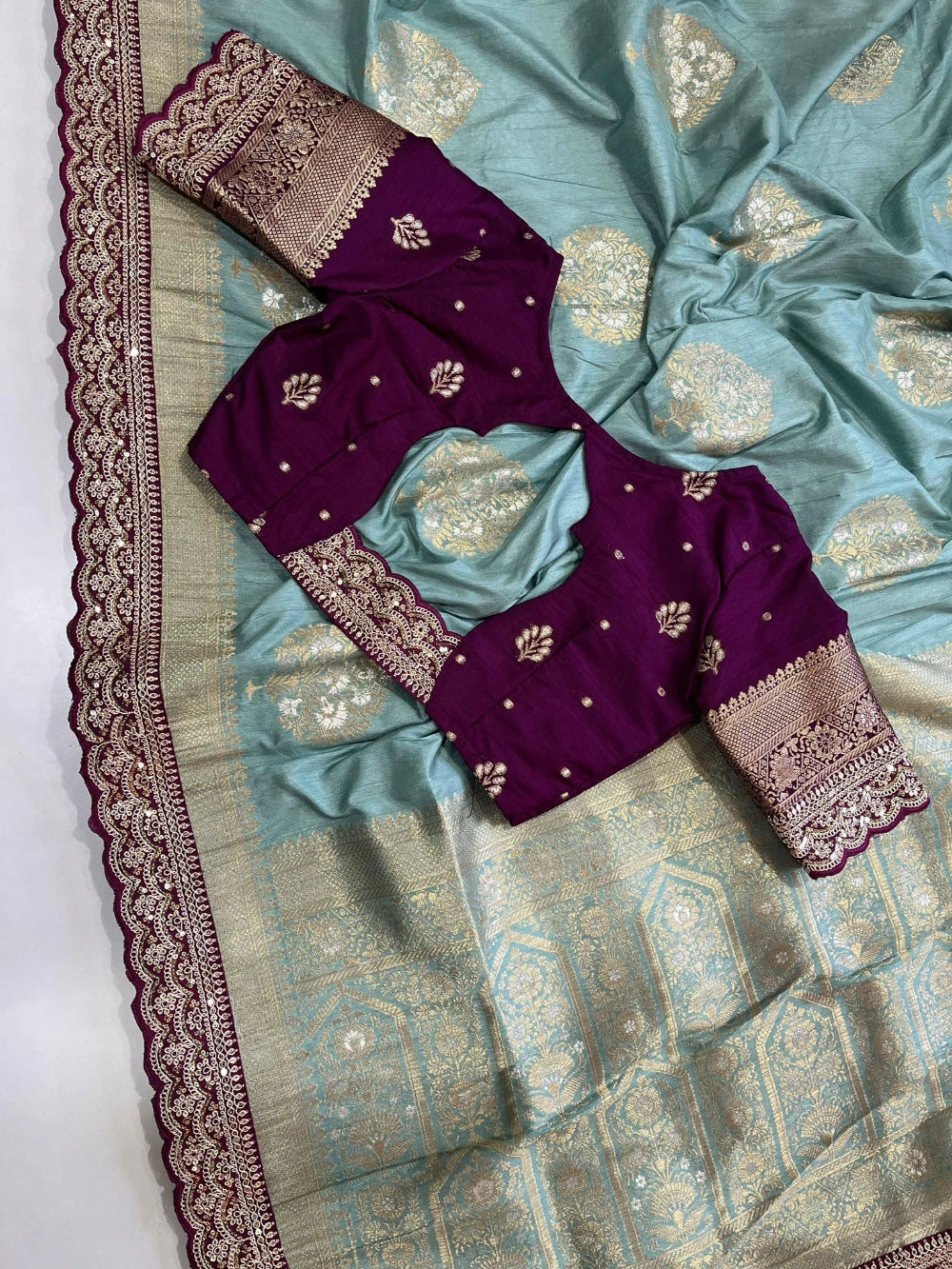 Pure Banarasi Pattu Saree with All-Over Floral Weaving, Double Scalloped Embroidery Border & Contrast Designer Stitched Blouse