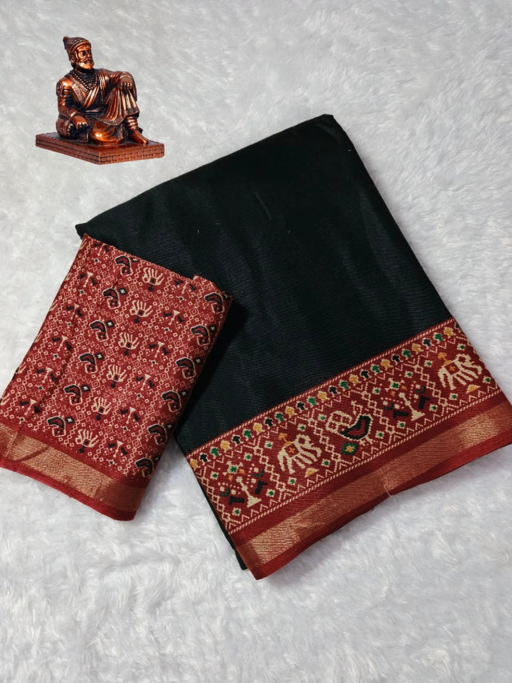 Saree Fabric: Heavy  blooming mull mull cotton saree with ajrakh patola print on allover saree with PERFECTLY MATCHED blouse piece and pallu attached mayura gold border