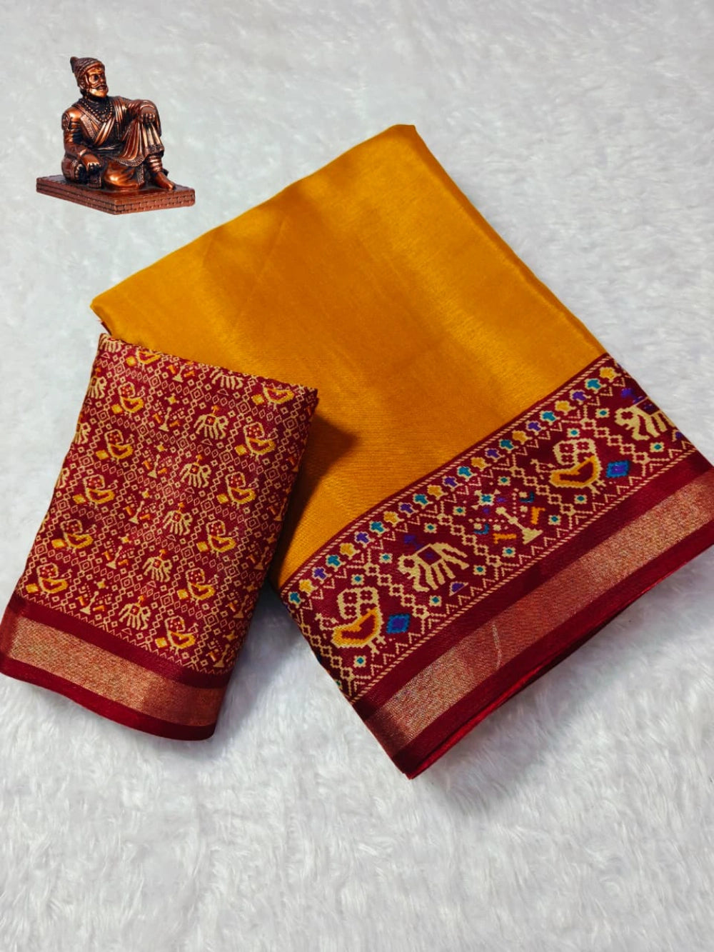 Saree Fabric: Heavy  blooming mull mull cotton saree with ajrakh patola print on allover saree with PERFECTLY MATCHED blouse piece and pallu attached mayura gold border