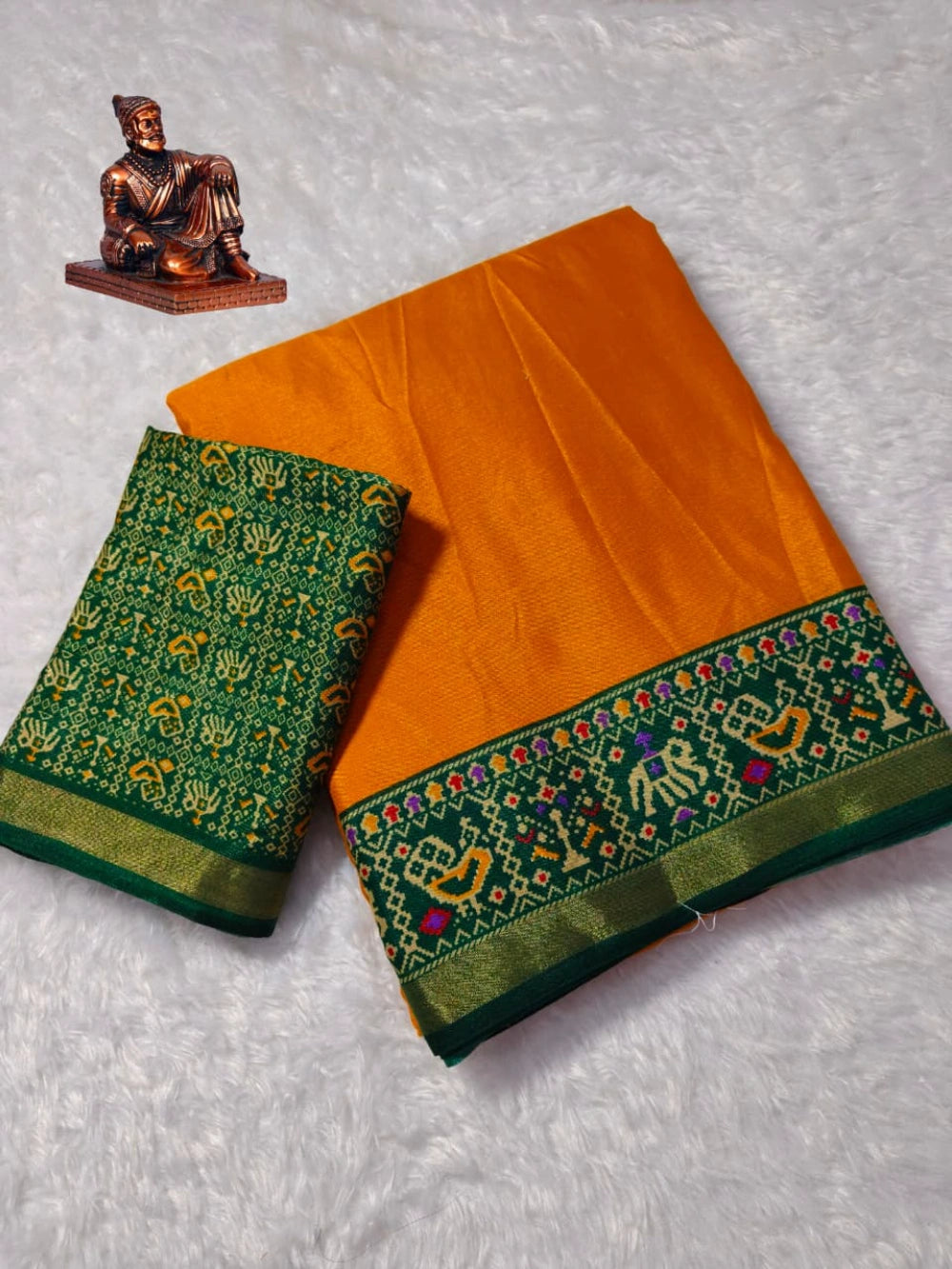 Saree Fabric: Heavy  blooming mull mull cotton saree with ajrakh patola print on allover saree with PERFECTLY MATCHED blouse piece and pallu attached mayura gold border