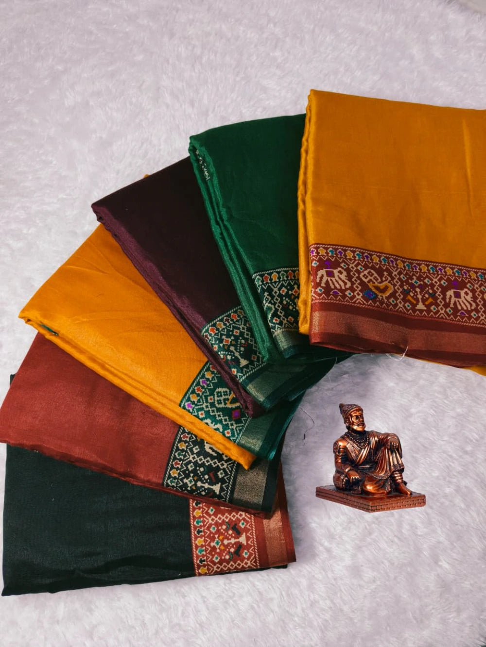 Saree Fabric: Heavy  blooming mull mull cotton saree with ajrakh patola print on allover saree with PERFECTLY MATCHED blouse piece and pallu attached mayura gold border