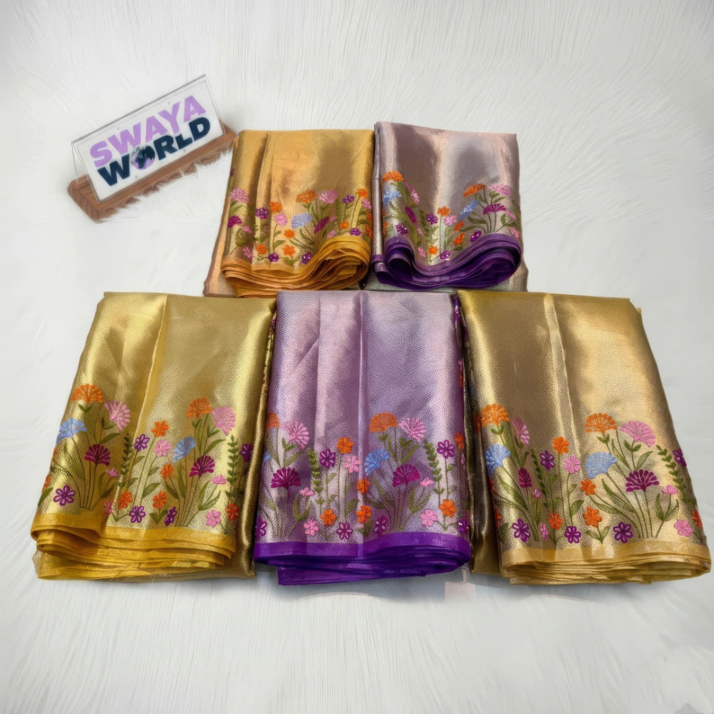 Set of gold and purple sarees with floral patterns on a white background, featuring 'Swaya World' branding.