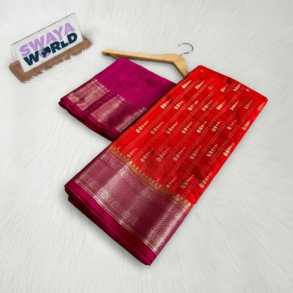 Red and pink saree with a hanger on a white background, branded 'Swaya World'.