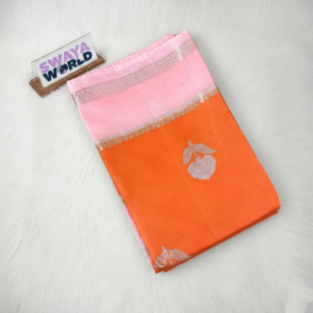 Orange and pink saree with a brand label on a white background