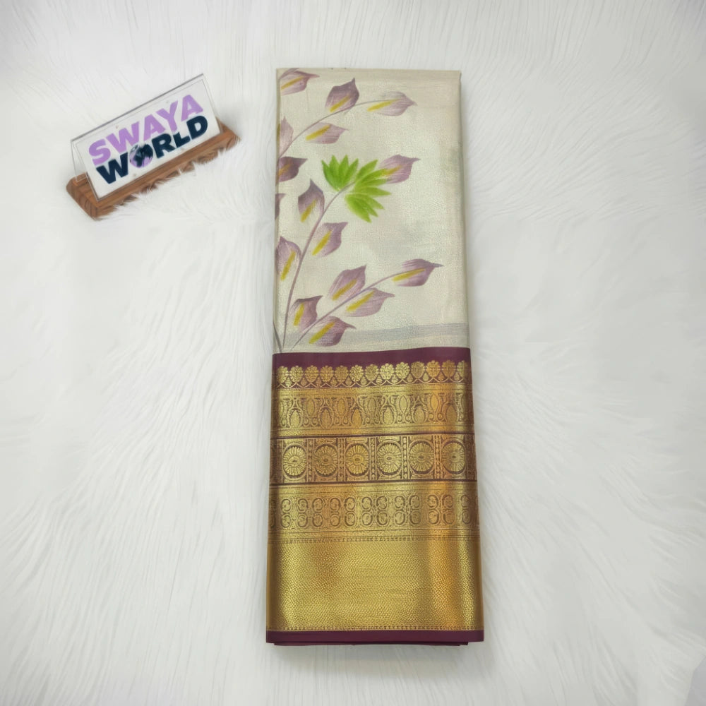 Brown colour Soft Banarasi tissue silk saree with hand‑painted jaal and contrast Kanchi border,  featuring the brand 'Swaya World'.
