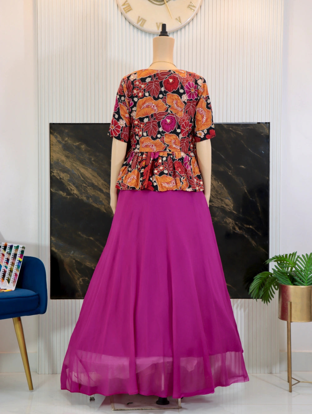 Pink georgette gown with corset lace-up back and autumn tapestry peplum coat – back view