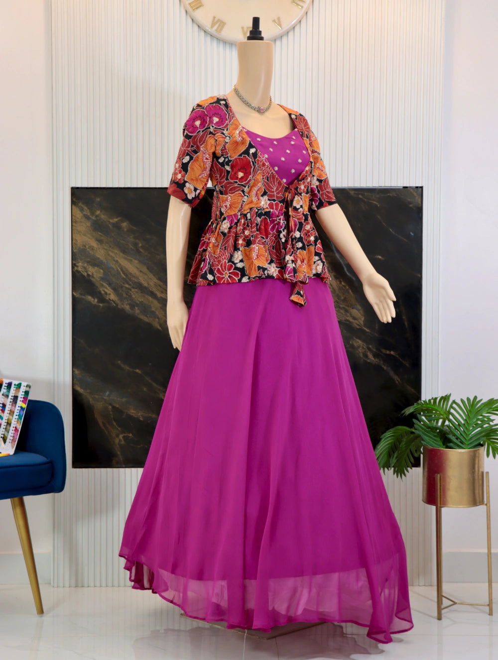 side angle of pink georgette gown with butti work and multicolor autumn tapestry peplum coat