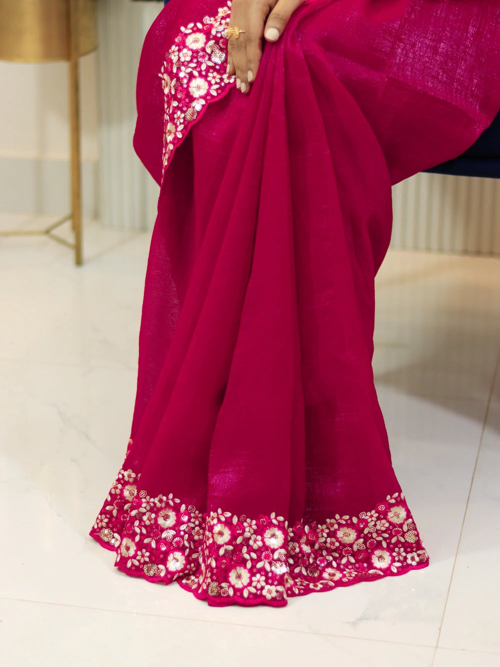 Rani Pink crunchy crush silk saree with embroidery and sequence work, scalloped cutwork border – close view