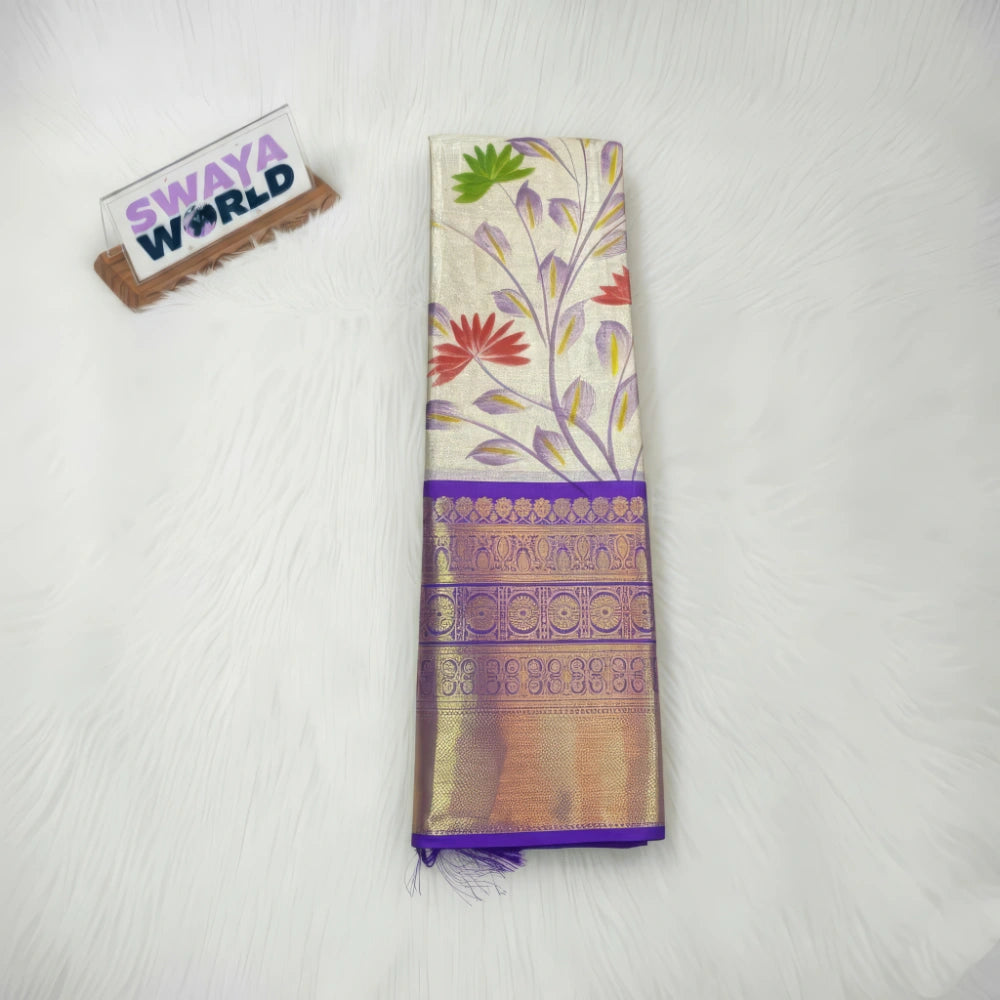 violet colour Soft Banarasi tissue silk saree with hand‑painted jaal and contrast Kanchi border,  featuring the brand 'Swaya World'.